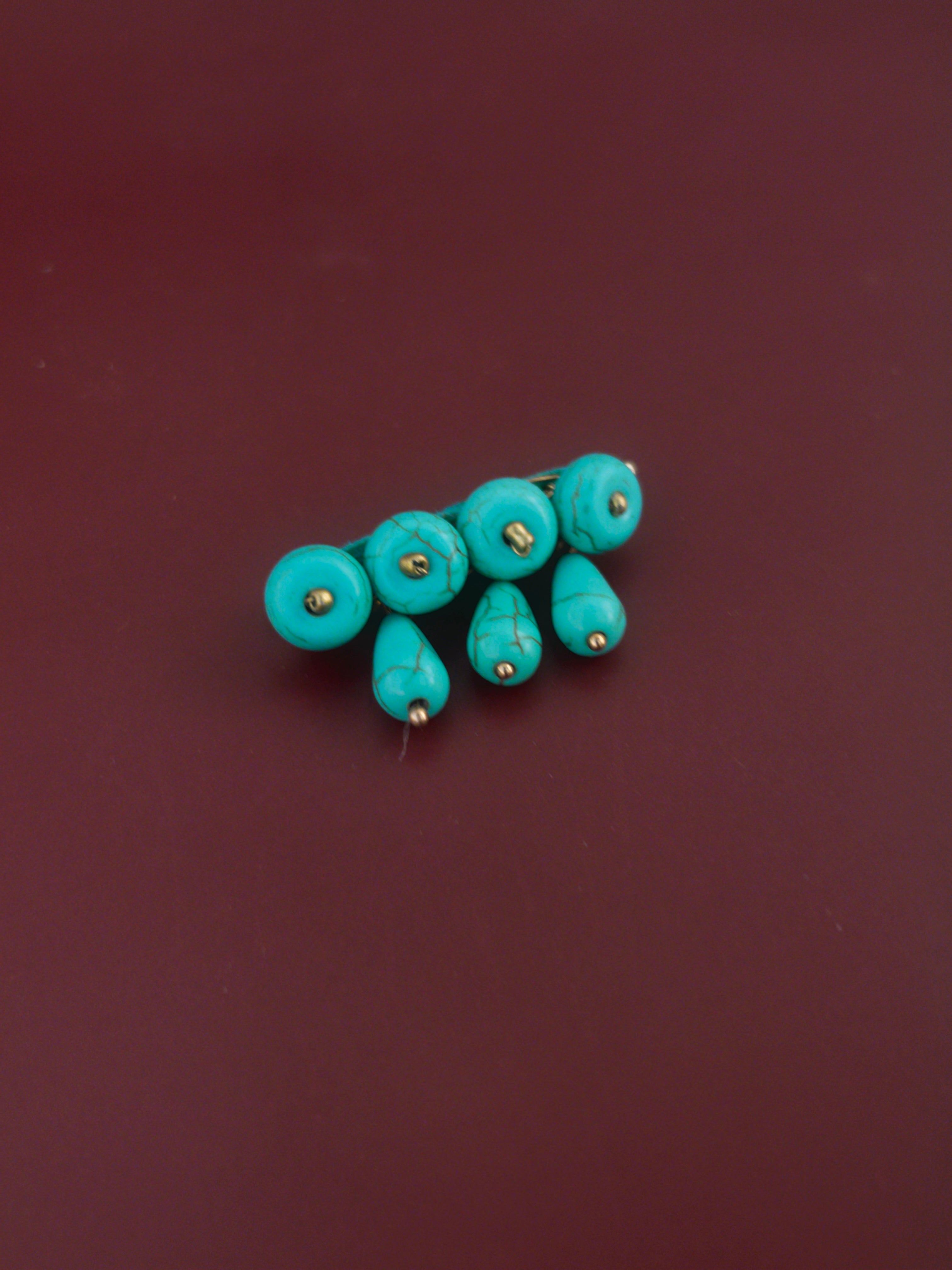 Broche círculos turquesa