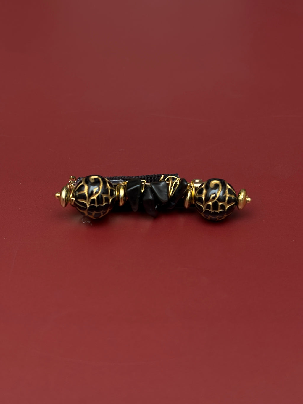 Broche Atrayana Negro