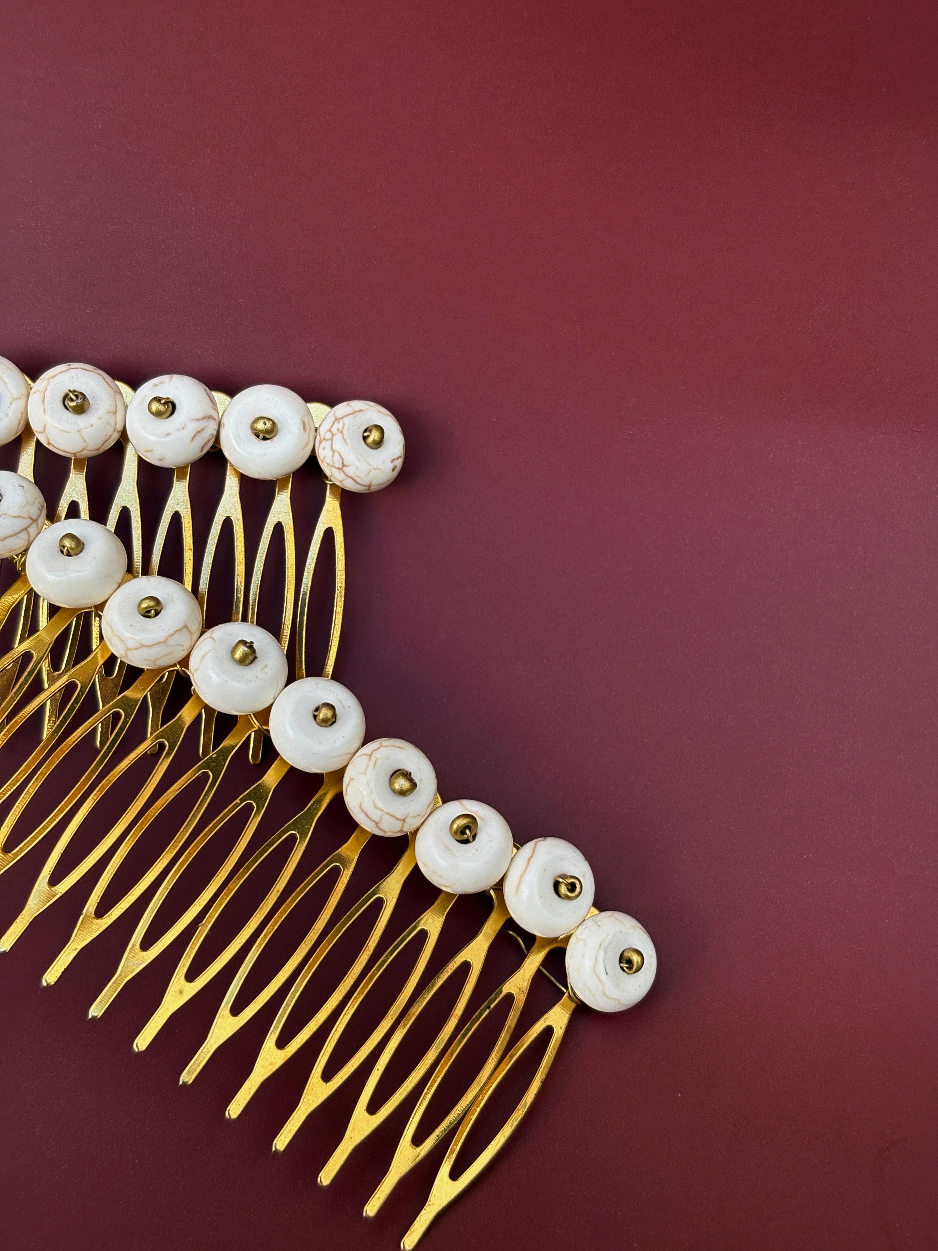 Peinecillo círculos hueso