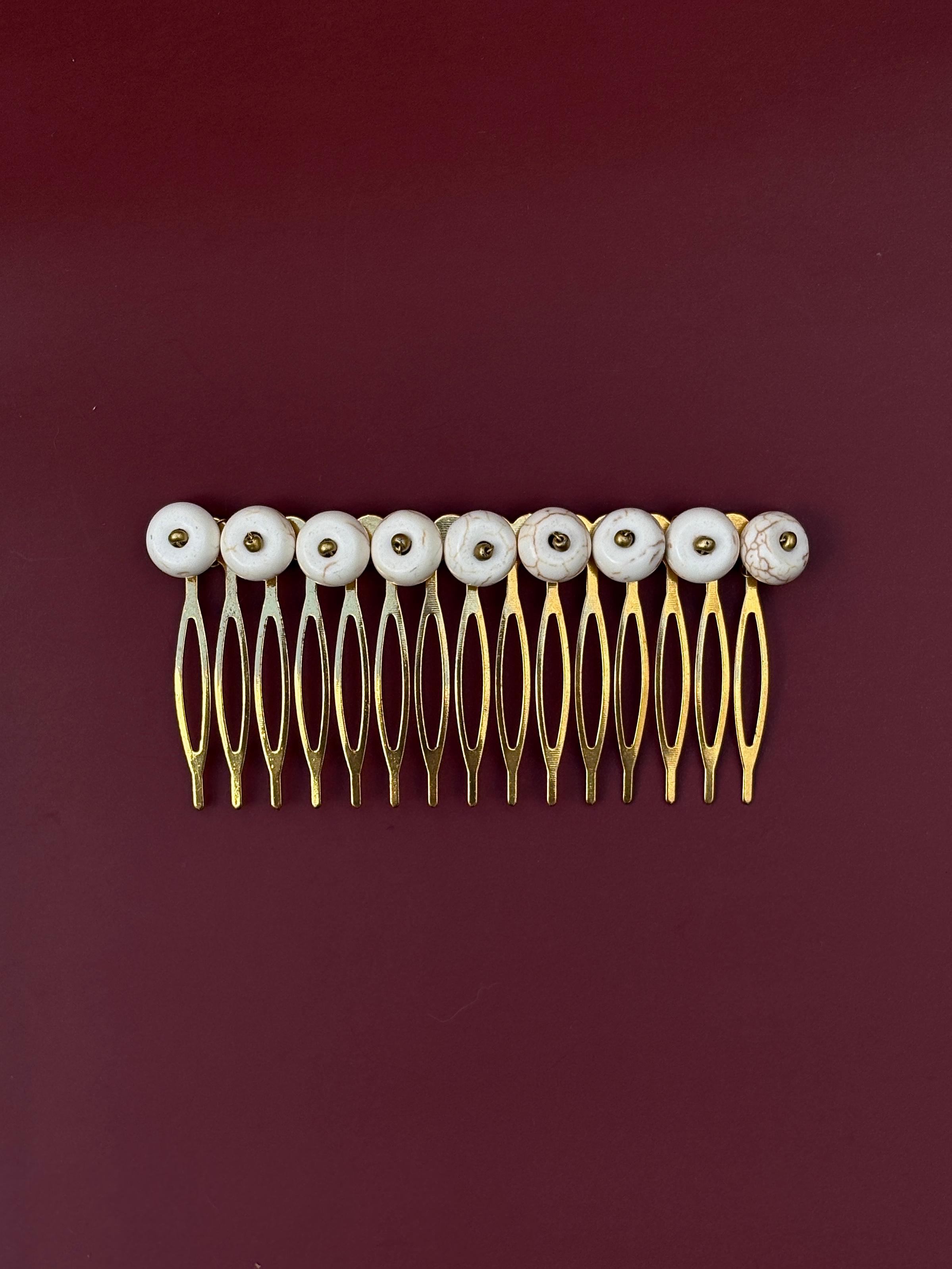 Peinecillo círculos hueso